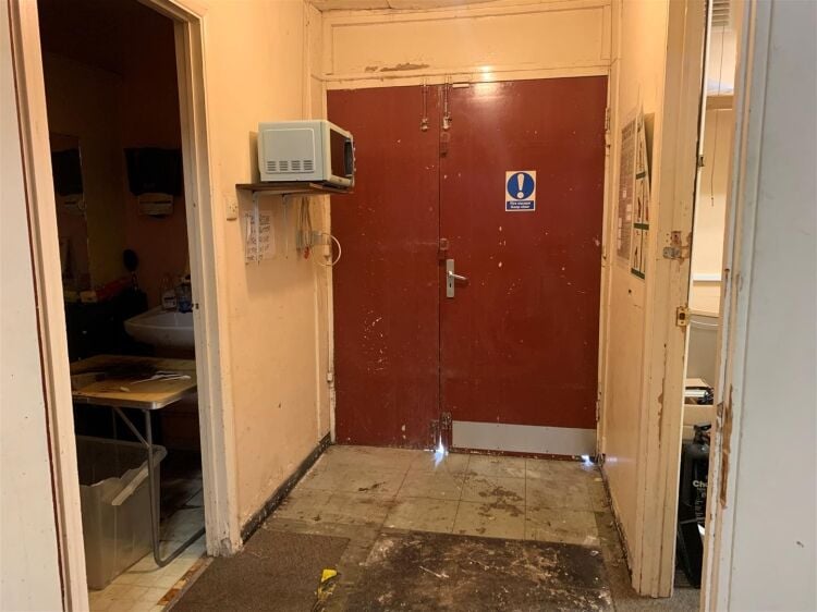 Terraced retail unit available in Bristol, featuring reception area, office, and rear toilet. Photo 7