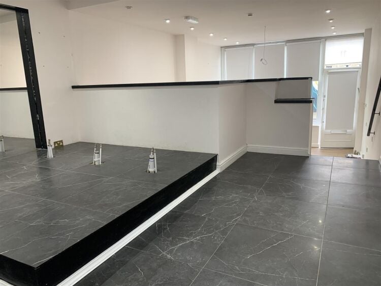 A very well presented retail unit of approximately 770 ft² arranged over two floors benefiting from a further terrace to the rear. the shop is ar Photo 7