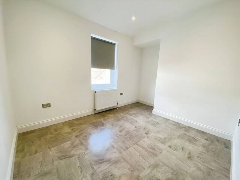 Mixed-use shop with two flats and garages for sale in Rochford Essex Photo 8