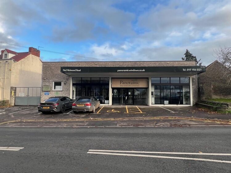 A large showroom of approximately 5,340 ft² with forecourt parking and a large, enclosed yard to the rear. the unit is situated in mangotsfield, Photo 7