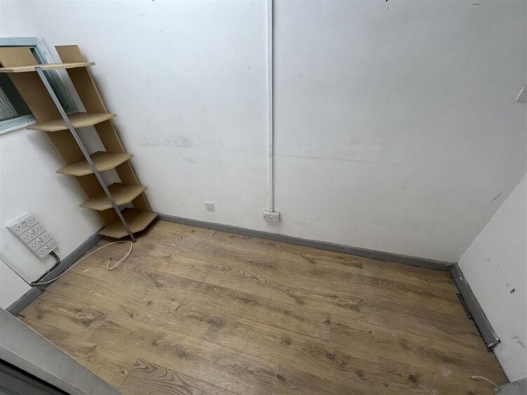 Ground floor industrial unit/workshop of approximately 1,256 sq ft arranged as open plan workspace with adjoining storage and workshop space. the unit Photo 7