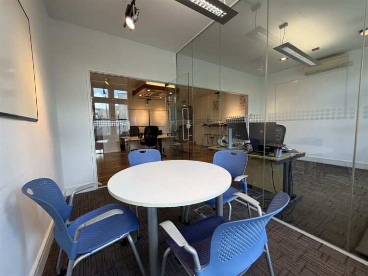 A well presented office suite extending to approximately 511 sq ft, thoughtfully arranged to provide a spacious open plan working area with the benefi Photo 7