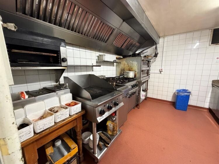 A fully fitted restaurant/bar extending to approximately 1,580 ft² benefiting from a fully equipped commercial kitchen, enclosed rear garden, and Photo 7