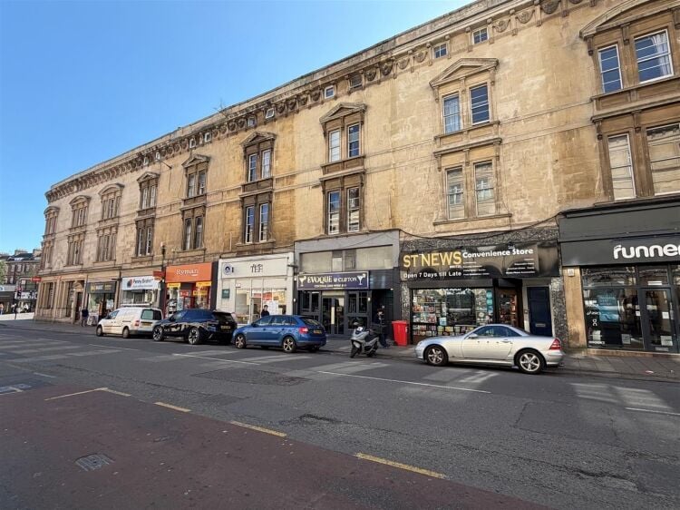 A fully fitted bar of approximately 1,035 ft² with additional basement stores and toilets, and an enclosed rear courtyard garden. the unit was pr Photo 7