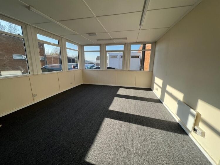 A well presented industrial unit of approximately 5,860 ft² arranged predominantly as a warehouse with ancillary offices/reception, male and fema Photo 7