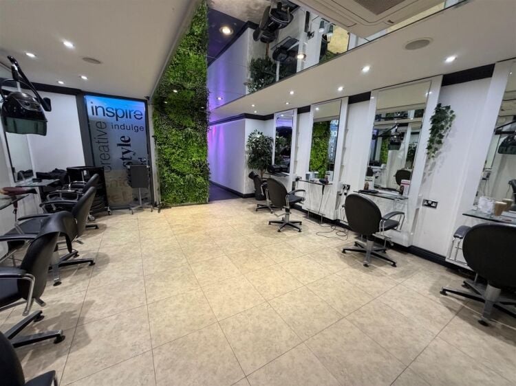 An extended two-storey retail premises located in the town centre, let to reflections hair salon at £32,000 per annum on a 10-year fully repairin Photo 7