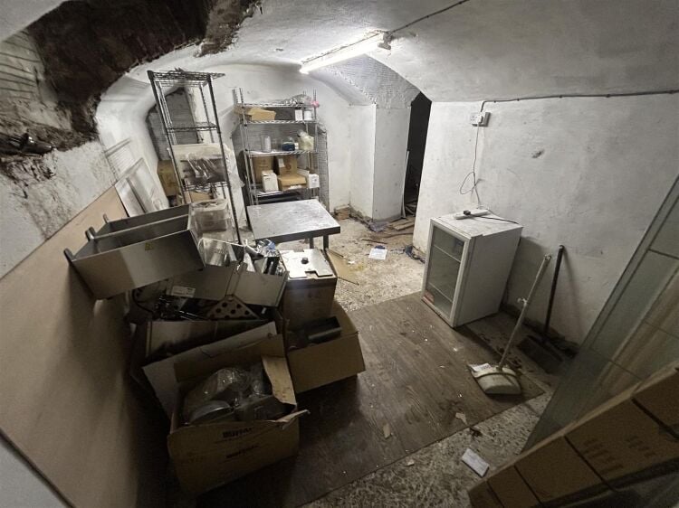 Ground floor restaurant/café of approximately 900 sq ft, with an additional basement level providing useful ancillary storage space. the property is Photo 7