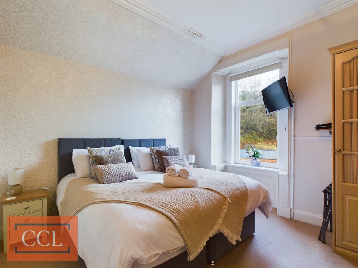 Victorian Charm Meets Modern Comfort in Expansive Lochwood House For Sale Photo 8