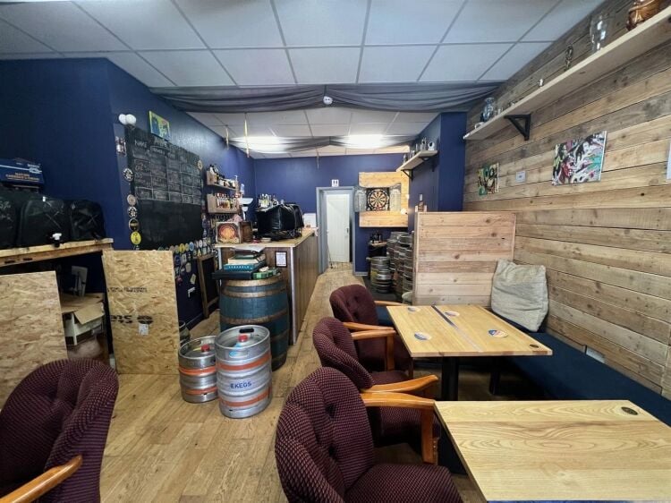 A microbrewery of approximately 464 ft² benefiting from an alcohol premises license and beer pumps. the shop is situated in a position position o Photo 8