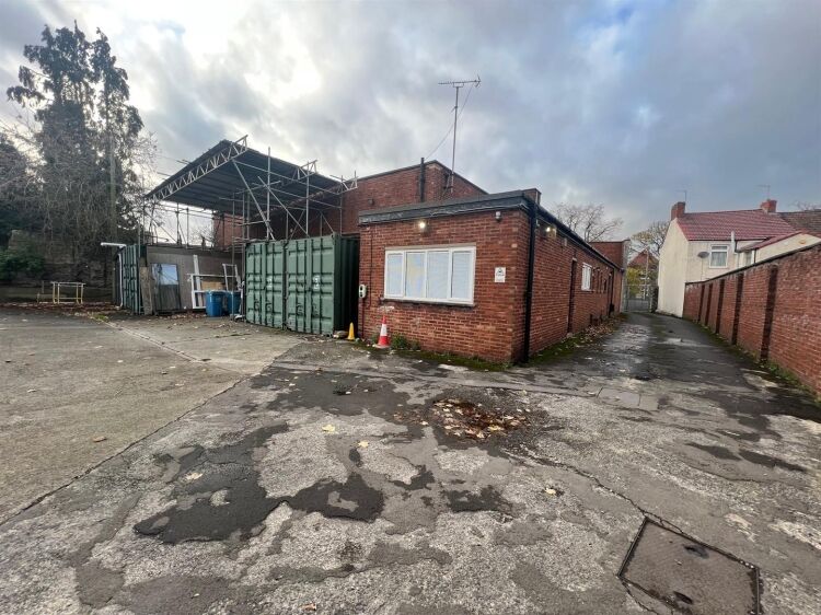 A large showroom of approximately 5,340 ft² with forecourt parking and a large, enclosed yard to the rear. the unit is situated in mangotsfield, Photo 8