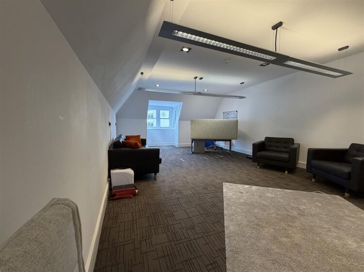 A well presented office suite extending to approximately 436 sq ft, thoughtfully arranged to provide a spacious open plan working area with shared kit Photo 8