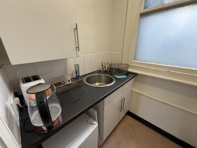 A well presented office suite extending to approximately 511 sq ft, thoughtfully arranged to provide a spacious open plan working area with the benefi Photo 8