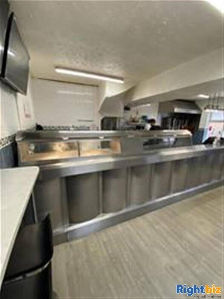 Prime Fish and Chip Takeaway with 3 Flats in Bustling Herefordshire for Sale Photo 8