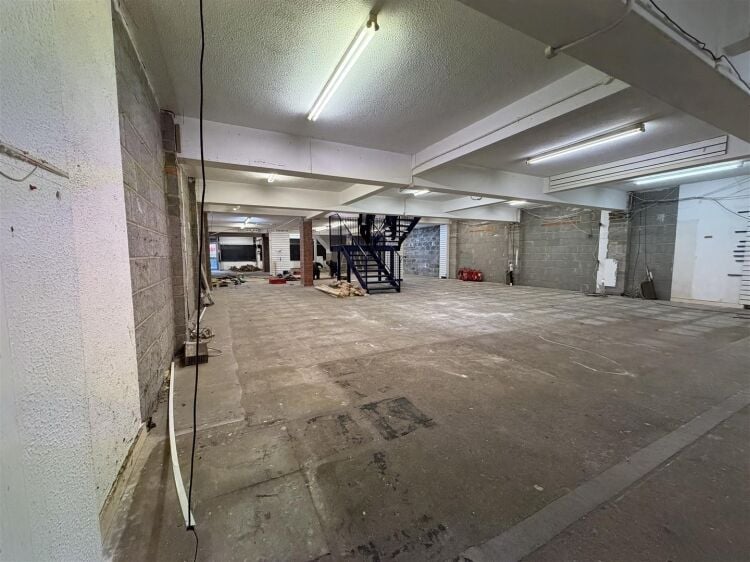 The property comprises a substantial retail unit extending to approximately 4,912 sq ft, arranged over ground and first floors. Photo 8