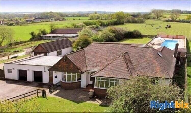Renovated Surrey Boarding Kennels with Spacious Detached Family Home on 4.5 Acres Photo 8