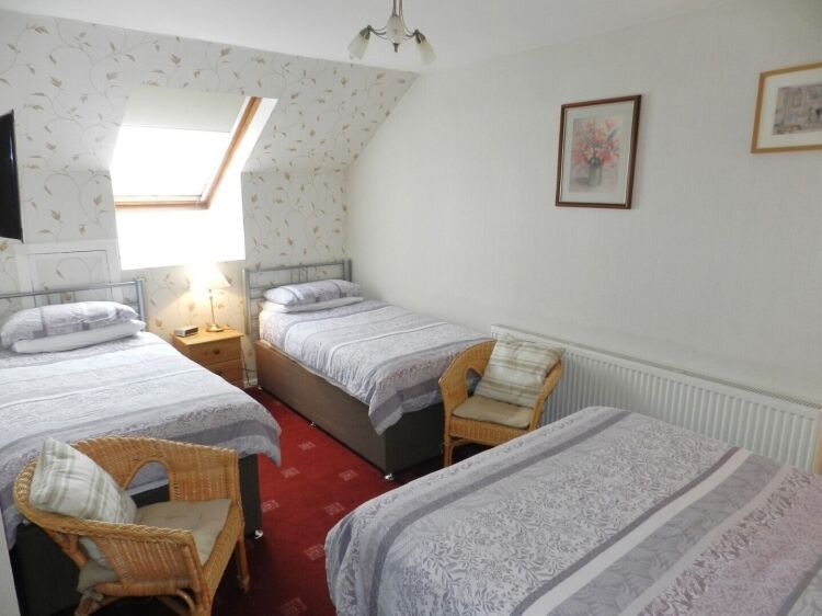 Six-Bedroom Guest House with Owner's Accommodation in Aviemore's Holiday Village for Sale Photo 8