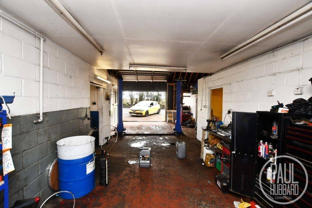 Prime Commercial Property with MOT Station, Workshop, Forecourt, and Cottage in Earl Stonham, Suffo Photo 9