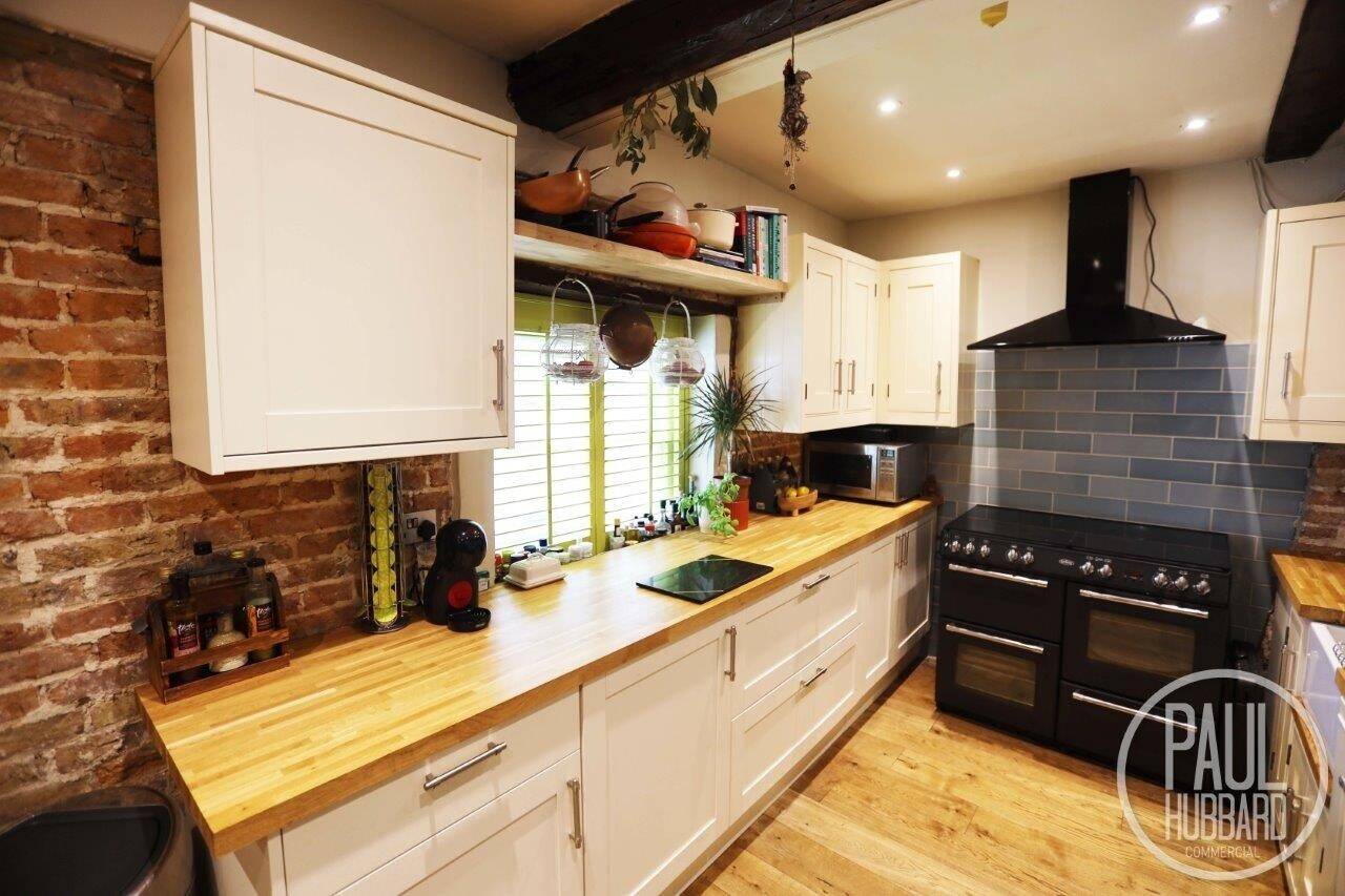 Grade II Listed Mixed-Use Property with Three Units in Historic Downham Market Photo 9