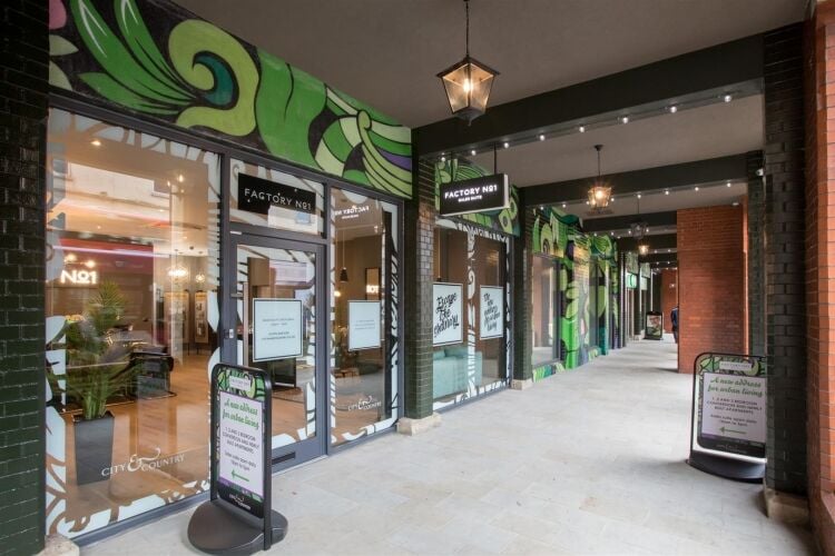 A modern retail unit of approximately 1,049 ft² situated in a busy trading position in imperial arcade, part of the city & country factory no. 1 Photo 9