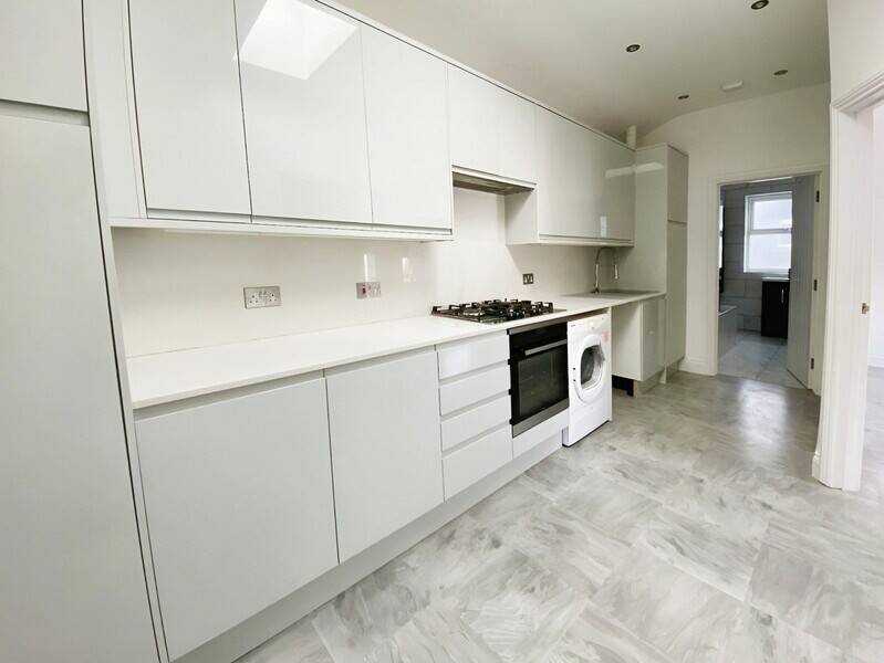 Mixed-use shop with two flats and garages for sale in Rochford Essex Photo 10