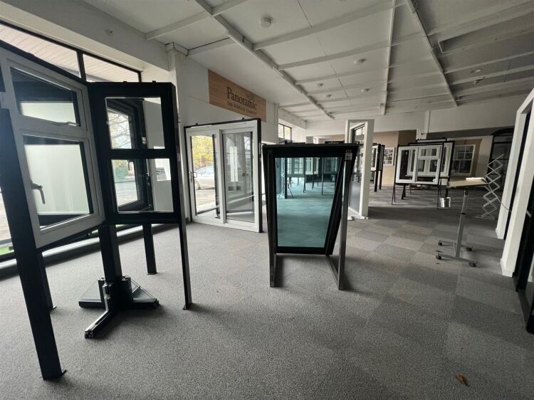 A large showroom of approximately 5,340 ft² with forecourt parking and a large, enclosed yard to the rear. the unit is situated in mangotsfield, Photo 9