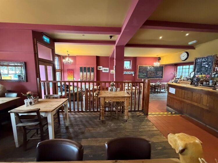 A fully fitted restaurant/bar extending to approximately 1,580 ft² benefiting from a fully equipped commercial kitchen, enclosed rear garden, and Photo 9