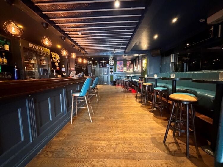 A fully fitted bar of approximately 1,035 ft² with additional basement stores and toilets, and an enclosed rear courtyard garden. the unit was pr Photo 9