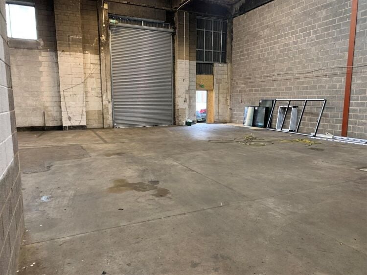 An industrial unit of approximately 2,500 ft² located within the printworks development which is currently undergoing significant redevelopment. Photo 9