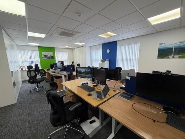 A modern semi detached office of approximately 2,272 ft² (211m²) arranged over two floors, with additional toilets, shower and reception lo Photo 9