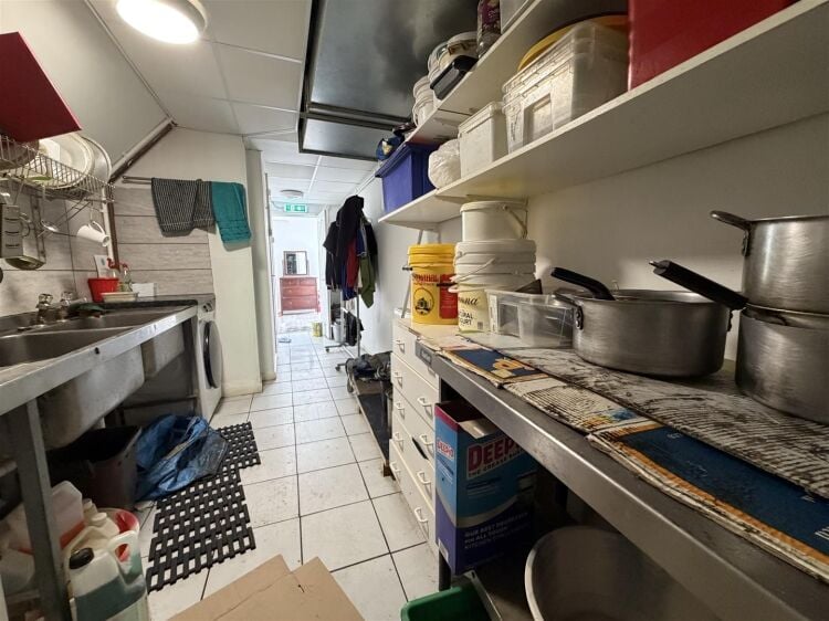 A fully fitted takeaway premises extending to approximately 876 sq ft. Photo 9