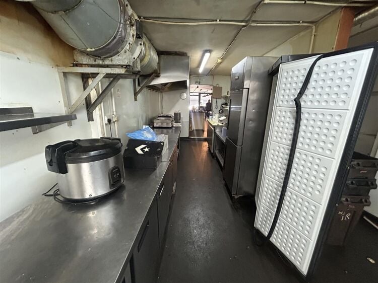 Ground floor restaurant/café of approximately 900 sq ft, with an additional basement level providing useful ancillary storage space. the property is Photo 9