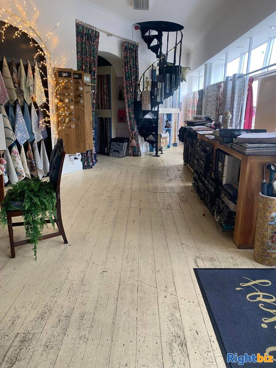 Interiors based curtain, blind, upholstery and fabric retail business