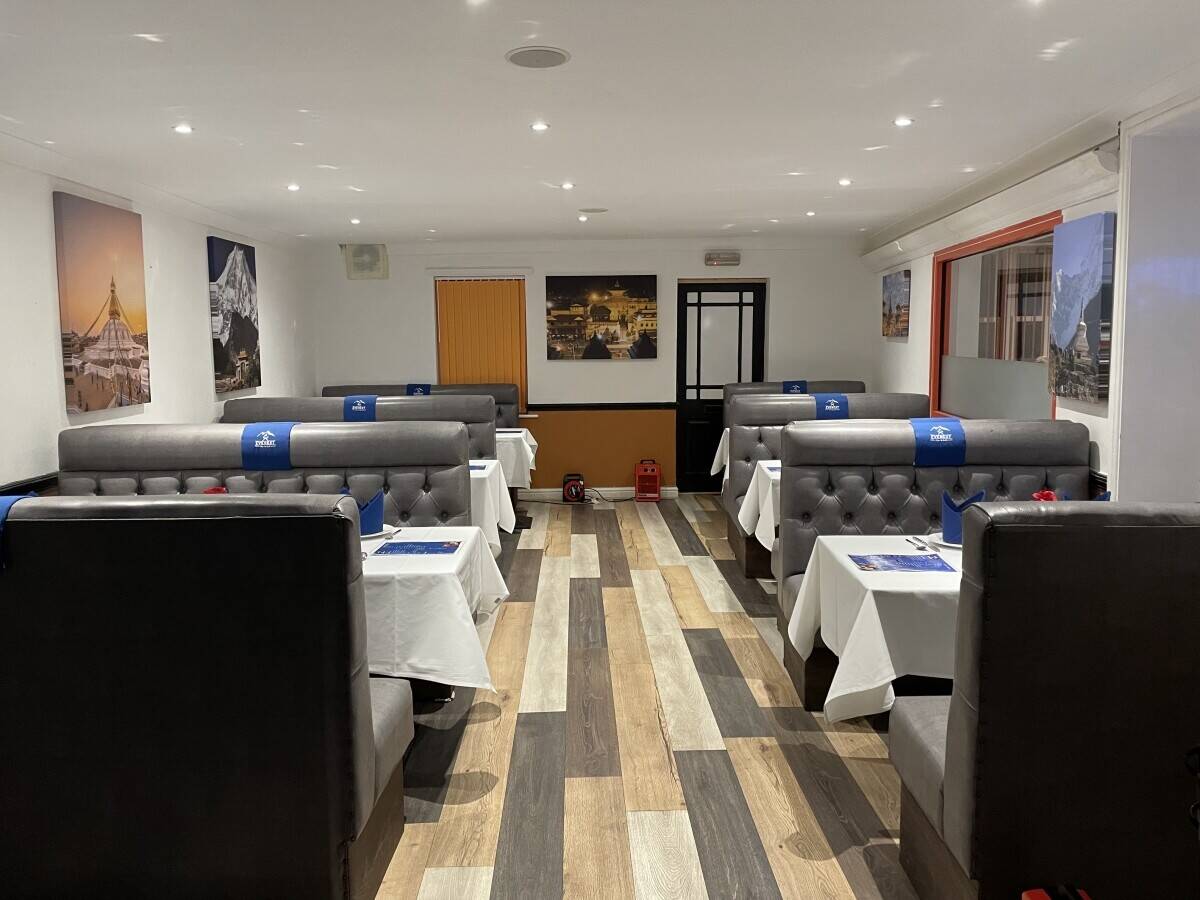 A leasehold Indian restaurant with sports bar on the basement and a party hall on first floor