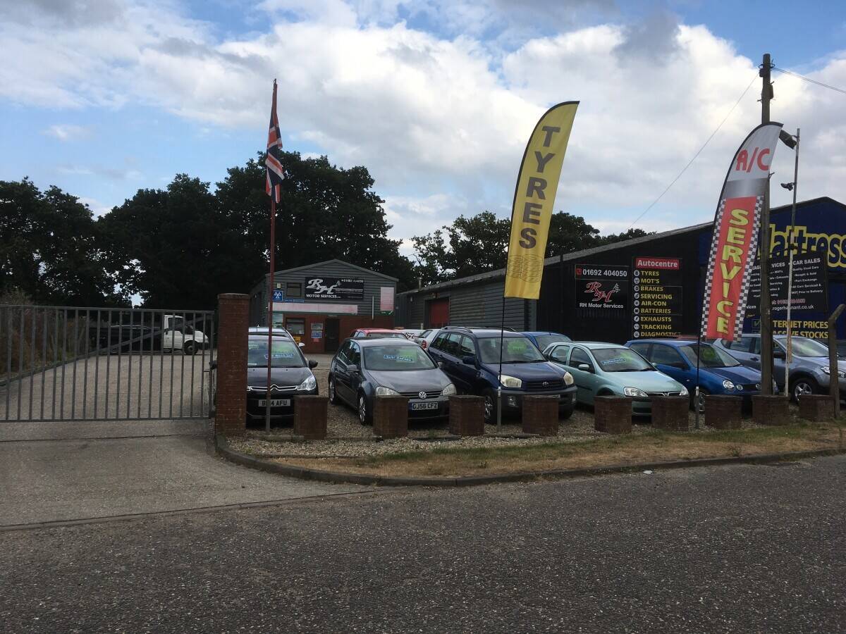 Garage Services MOT Station and Car sales in prominent main road location to large market town.Devel