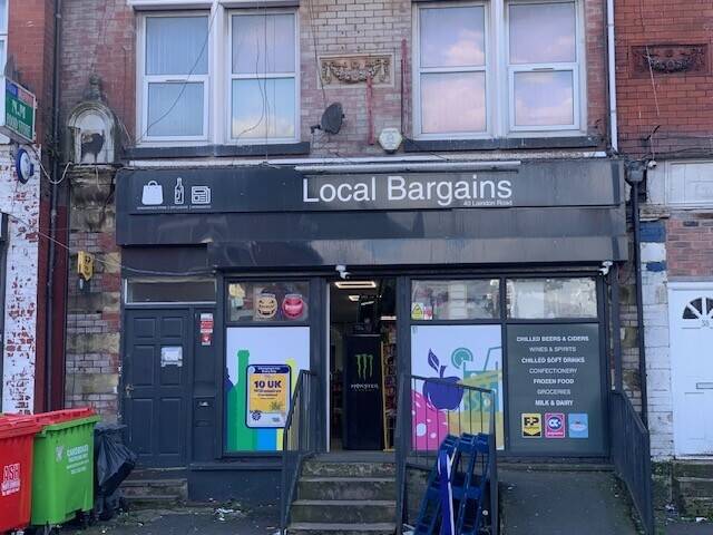 A long established off licence and convenience store in Manchester, other businesses forces sale. Photo 1