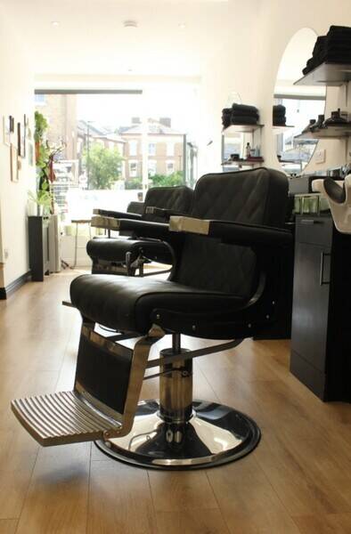 Popular Barber’s Shop on Busy Road in North London Photo 1