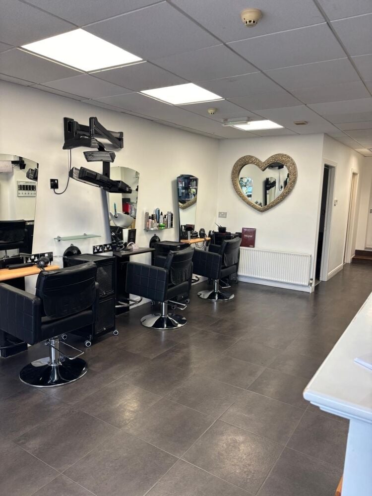 Hair and beauty business with flat above in location with rental income and development potential