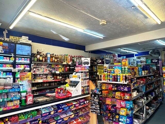 Convenience store and off license for sale in a spacious four-storey premises with accommodation