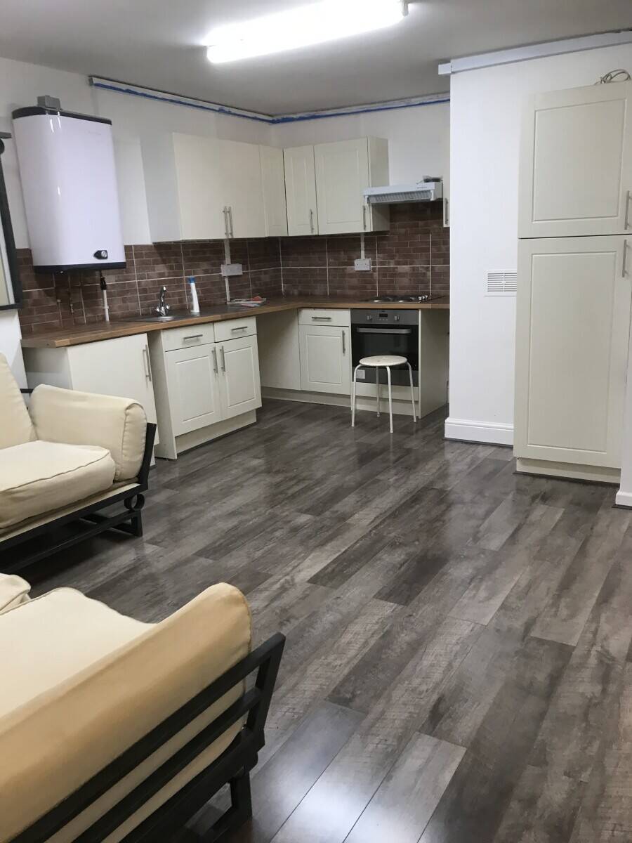 Well established laundrette business with two self-contained flats