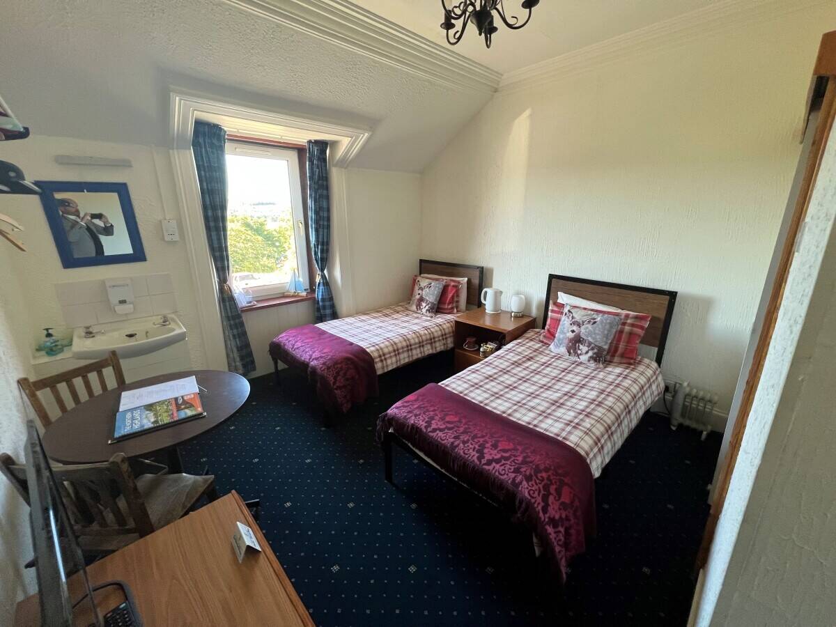 Well appointed Highland hotel offered with great potential for new owners. Photo 11