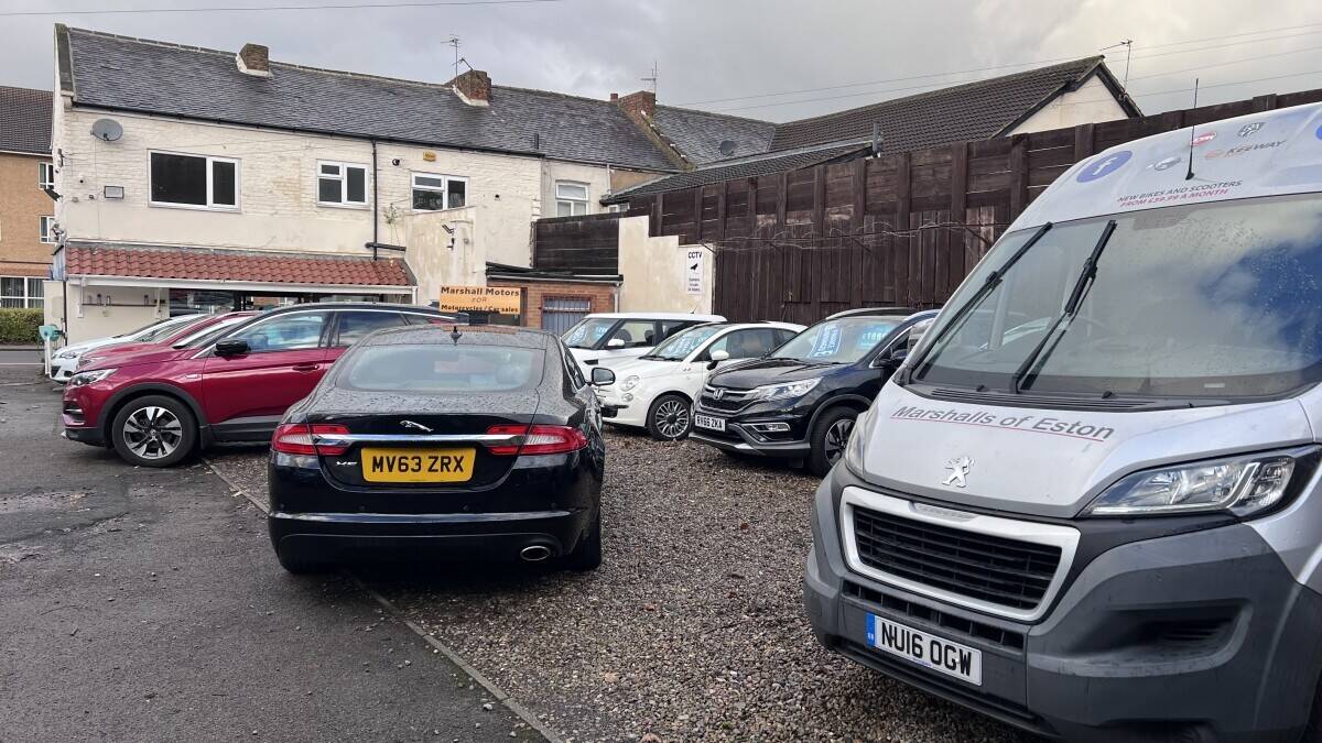 Established Car sales and repair dealership with flats.With planning permission to build on Photo 11