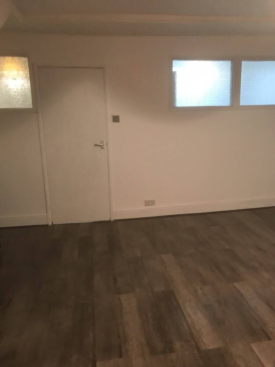 Well established laundrette business with two self-contained flats