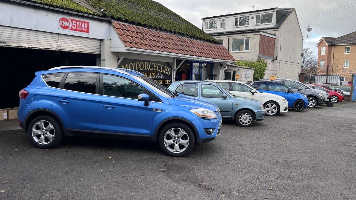 Established Car sales and repair dealership with flats.With planning permission to build on Photo 12