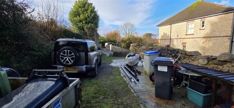 Auction Lot: Renovation-Ready 3-Bedroom Cottage plus Development Land For Sale in Newton Abbot