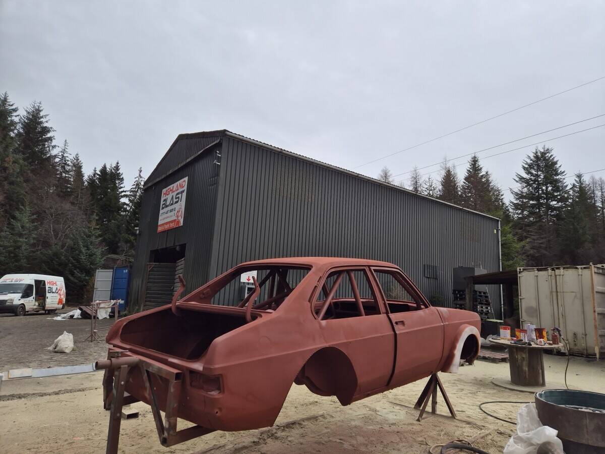 Well established abrasive blasting and powder coating business for sale in Highland Photo 14