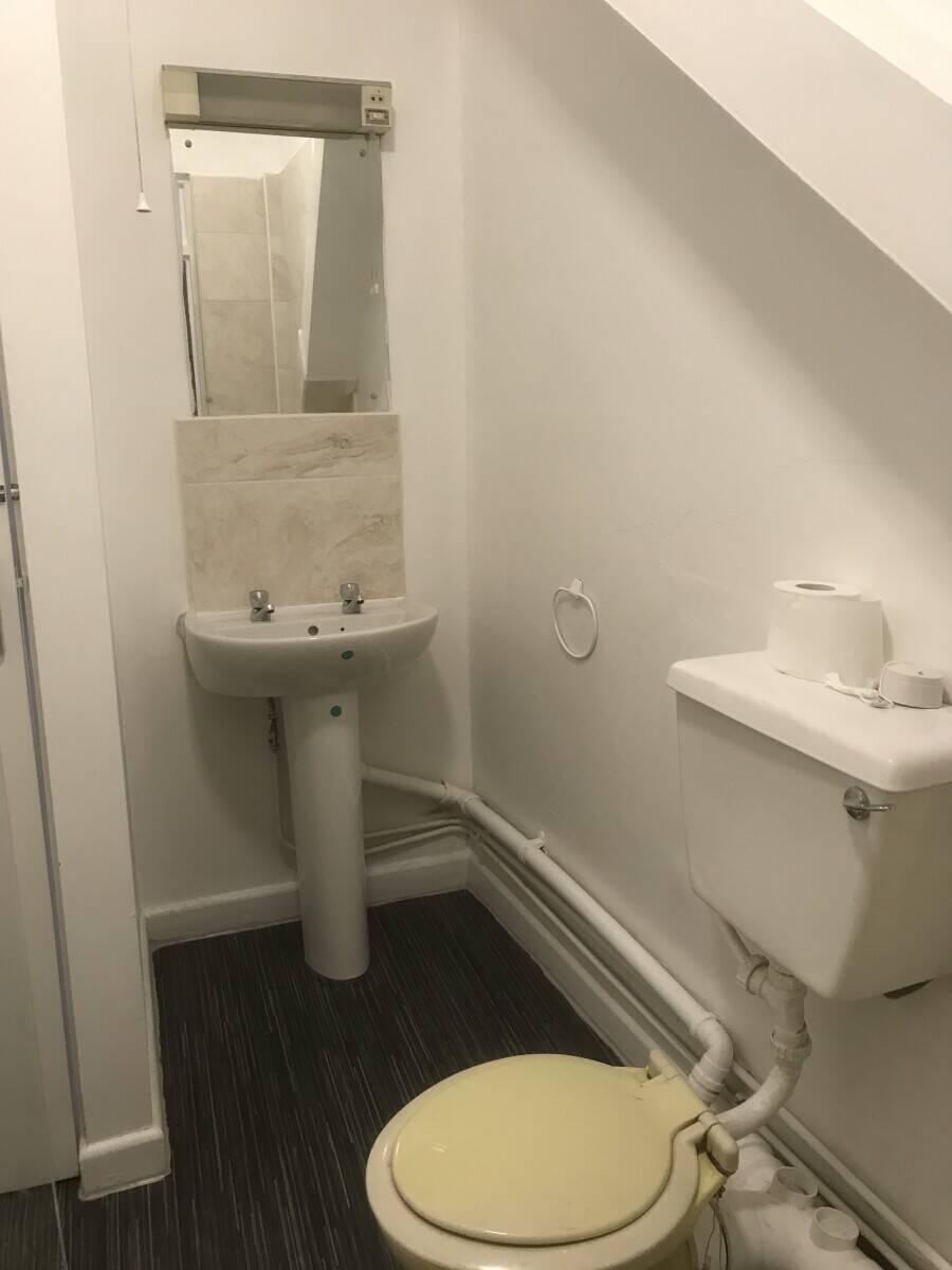 Well established laundrette business with two self-contained flats