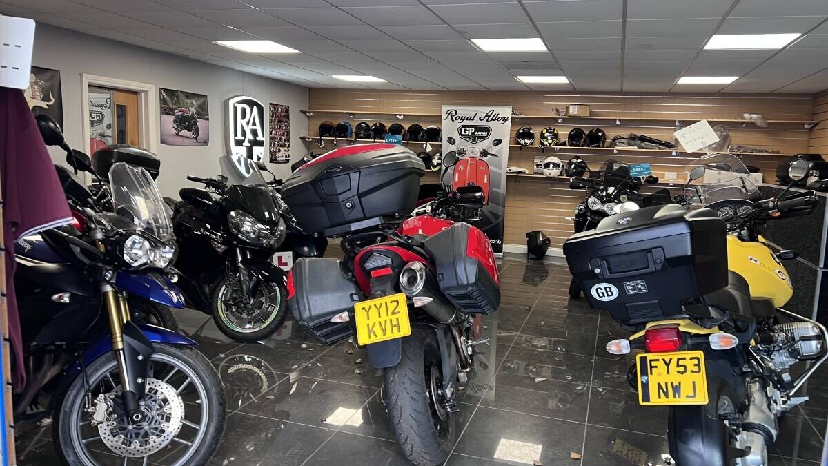 Established Car sales and repair dealership with flats.With planning permission to build on