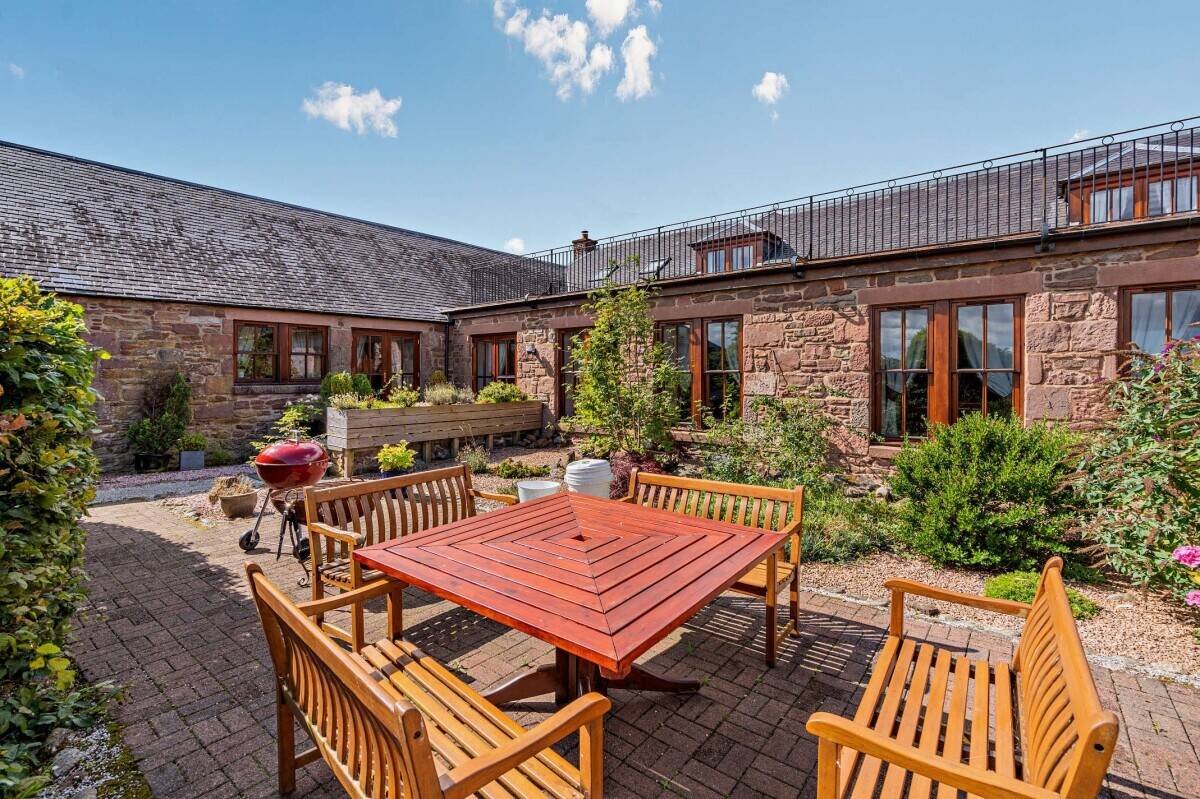 An exceptional house comprising 4 cottages (previously used as holiday rental), paddock and land. Photo 14