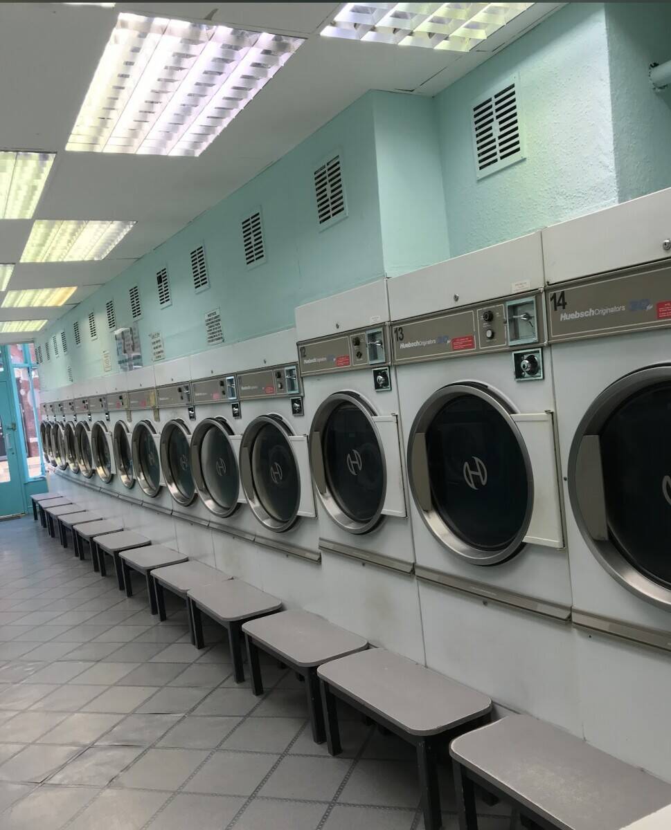 Well established laundrette business with two self-contained flats