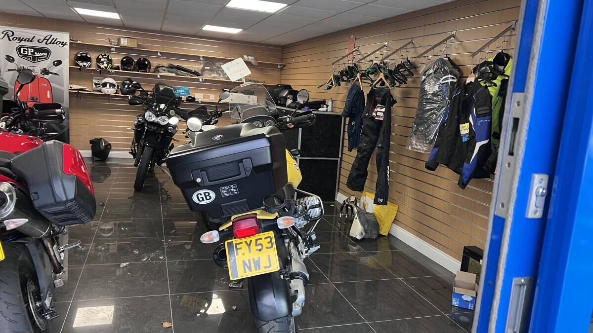 Established Car sales and repair dealership with flats.With planning permission to build on